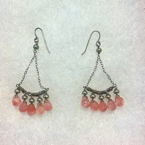 Beautiful chandelier earrings with pink stones.